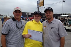 John and Chase Harnage with 4 State Trucks’ Bryan Martin