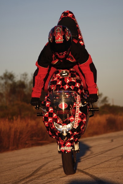 Motor cycle stunt driver Jesse Toler will attempt to break the world record stoppie length Saturday at 3:30 p.m.