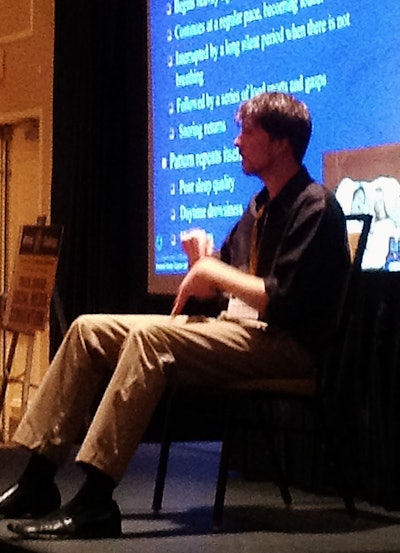 Sign interpreter at the Truck Driver Social Media Convention rendered Elaine Papp’s talk to Deaf Truckers United members on hand.