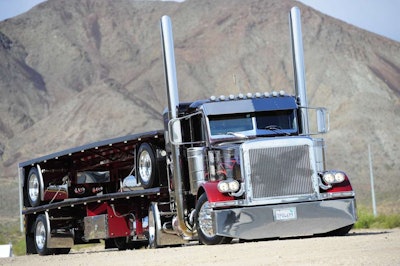 Ryan Hooten’s 1995 Peterbilt 379, shown by Tommy Larsen, won Best of Show, Working Combo.