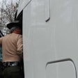 Trooper in cab doorway