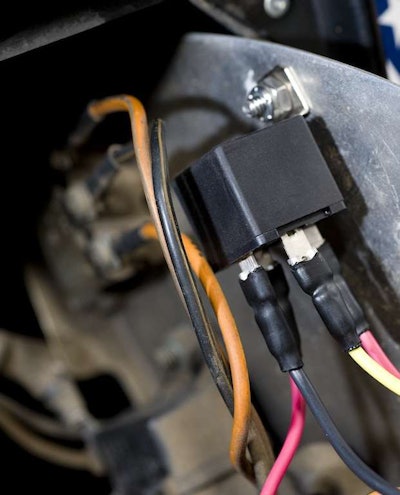 Mount the headlight relay where it’s high and dry.