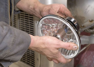 Install new headlights in housings, and test high/low-beam system. Adjust headlights as necessary.