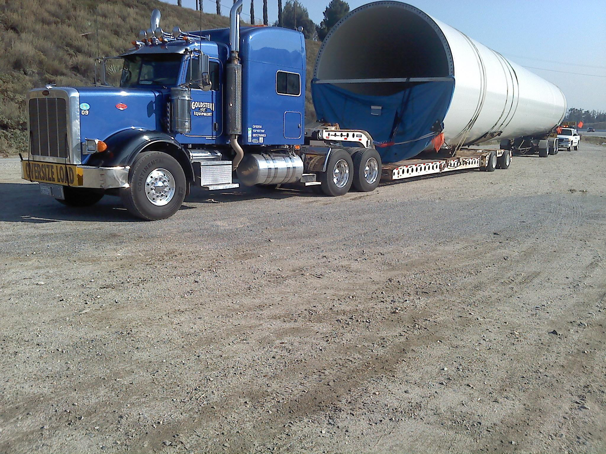 This middle section of a 300-foot-tall windmill tower was sent in by reader Paul Goldstein. It was hauled from San Diego, Calif., to Jawbone Canyon by the 2009 Peterbilt 367, powered by a 600-hp Cummins with an 18-speed transmission and two-speed rears. Load weight: 106,000 lbs.