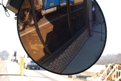 Mirror and trucks at inspection station