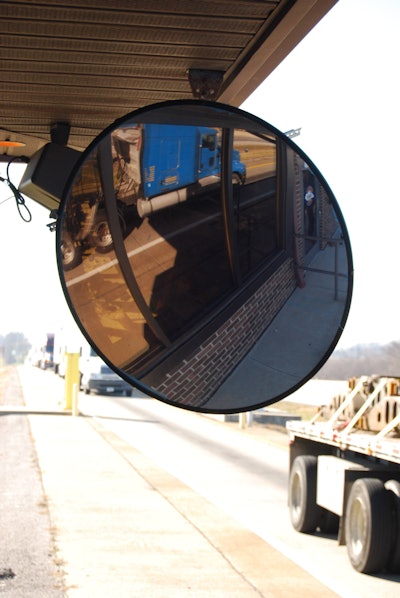 Mirror and trucks at inspection station