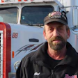 Independent owner-operator Melvin Davis Jr., with his 1988 Freightliner FLD