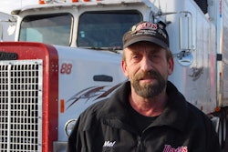 Independent owner-operator Melvin Davis Jr., with his 1988 Freightliner FLD