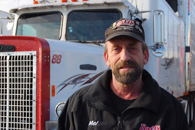 Independent owner-operator Melvin Davis Jr., with his 1988 Freightliner FLD