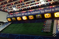 Winners roll balls into a series of holes to advance their truck for a t-shirt or hat at DAT’s MATS booth #65188 in the West Wing.