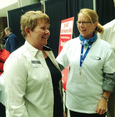 Owner-operator Linda Caffee shares a laugh with Administrator Ferro.