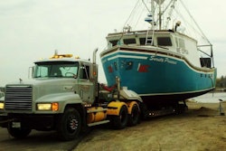 Tim Toppin of Toppin’s Diesel and Marine Service (Maine) sent in this shot, which he describes as showing an annual removal of the “48-ft.-long by 23-ft.-wide dragger”, the Surrette Pricess, for maintenance. “This one always makes me sweat a little bit. It weighs more than 100,000 pounds alone. Getting it placed on the trailer in the correct position and then pulling it out of the water like you would do with your bass boat gets a little tense.”