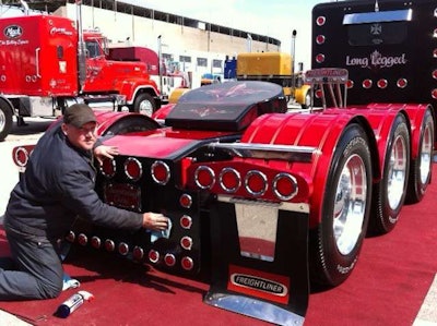 Johnny Byers prepares his 1988 Freightliner for competition.