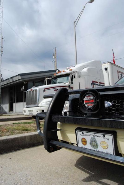 Tennessee Highway Patrol car and truck at weigh station
