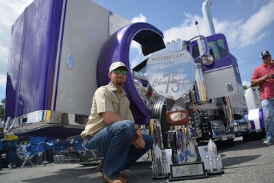 Raleigh, Miss., native Austin Ashley poses with his Best of Show trophy — among other pieces of hardware — and his 2007 Peterbilt 379.