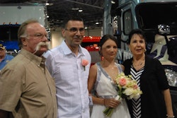 Truck owners Bill and Marie Sandvik pose with bride and groom Sebastien Requena and Bihler Sylvie.