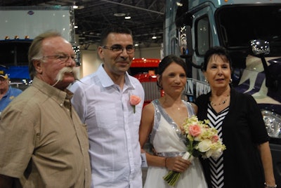 Truck owners Bill and Marie Sandvik pose with bride and groom Sebastien Requena and Bihler Sylvie.