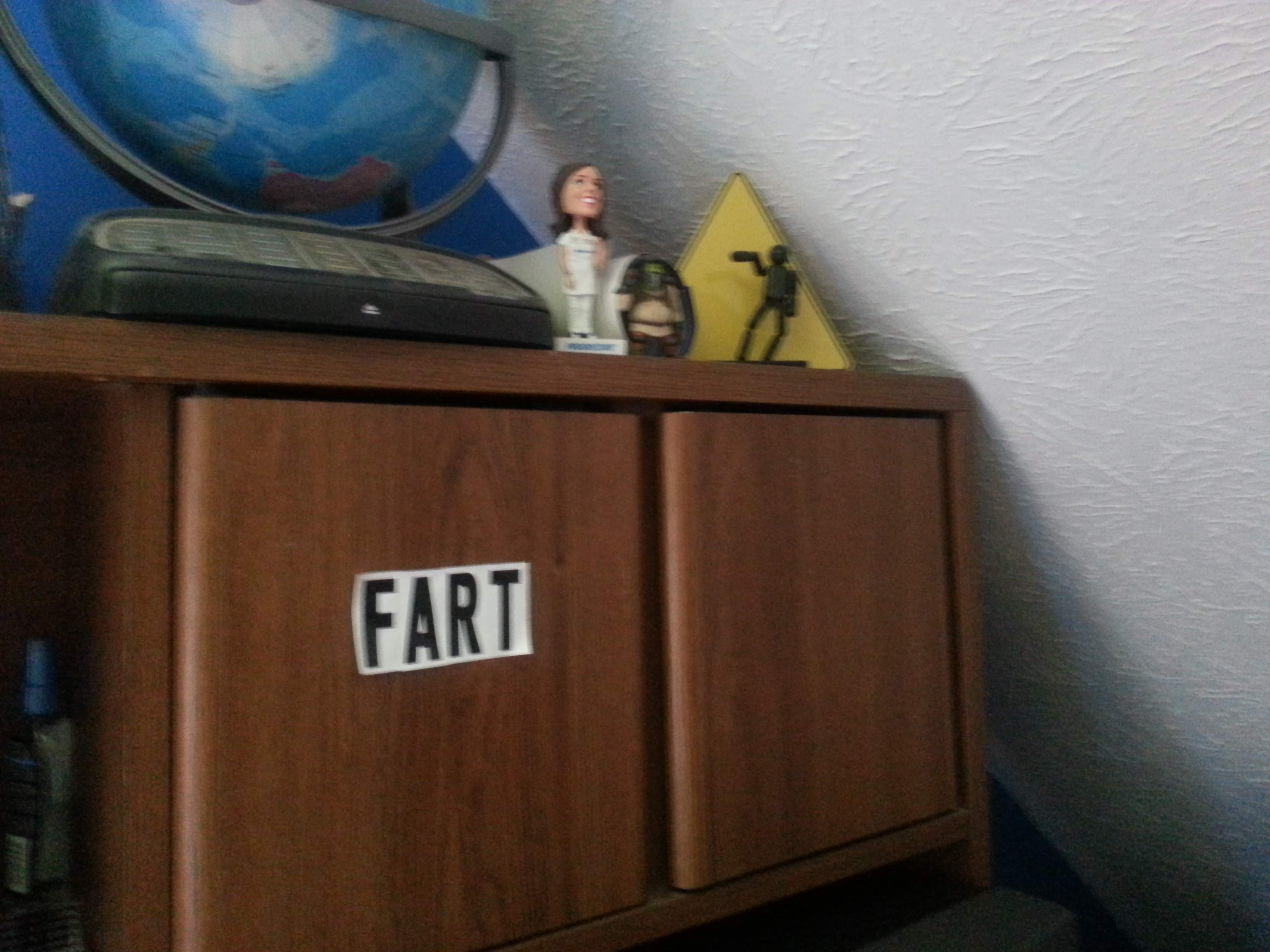 Fart on Wendy's office cabinet