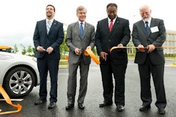 Virginia Gov. Robert McDonnell, second from left, helps cut a ribbon for the Virginia Connected Test Bed.