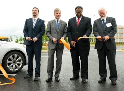 Virginia Gov. Robert McDonnell, second from left, helps cut a ribbon for the Virginia Connected Test Bed.