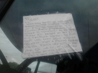 This photo was posted by driver Steven Weber to Facebook after he saw it on the window of a truck parked next to him in Coon Rapids, Minn. Click through it for a larger version on Facebook to read it.