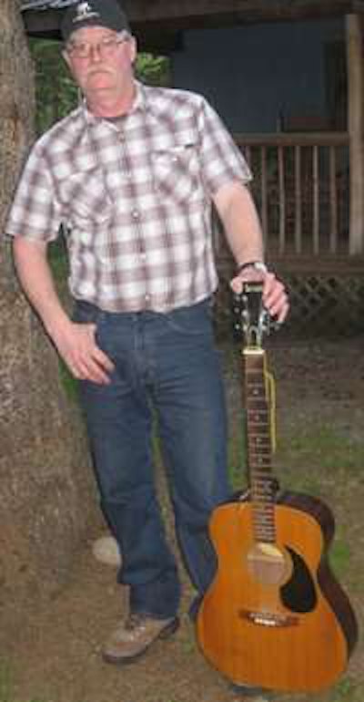 Click through the picture of Paul Hutchins and his guitar for his story at the Team Run Smart site.