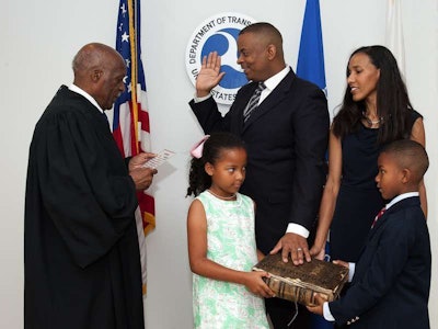 Secretary of Transportation Anthony Foxx as he’s sworn in, standing next to wife Samara and children Hillary and Zachary.