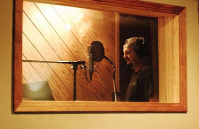 Tony Justice in the vocal booth at County Q Studios.