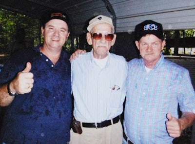 Billy Cockerill (center) with Ardis (left) and J.B. Hodge — Cockerill is the most senior member of the S.C. operators, with 60 years of driving in his side-view.