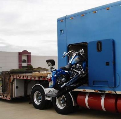 The rear 50-inch compartment on the ICT sleeper functioned as a garage with an electric motorcycle lift. “Keeps the bike clean like it is in the backseat of your car,” says Blair.