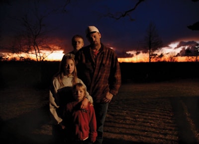 From the book “Eighteen,” Tim Young and his children.