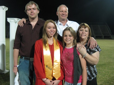 Tim Young (white shirt) and his family.