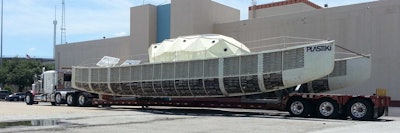 Darrell Hendrix of STS Heavy Hauling uploaded these shots of an STS rig hauling the Plastiki vessel from Fair Park to Perot Museum of Nature and Science in Dallas. All in all: 65 feet long by 22 wide and 15 high.