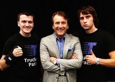 Trucker Path reps with Shark Tank biz start-up competition show actor Robert Herjavec.