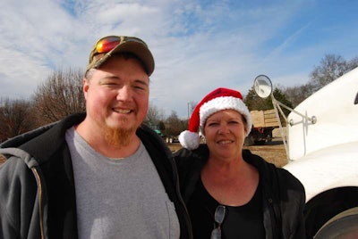 TLD Logistics driver John Dyer and Nashville Wreaths Across America coordinator Annette Robeck