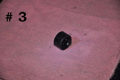 Dirty oil wiped out these turbo bearings, which are brass or copper sleeves. The bearing spins at half the rate of the turbine shaft: At idle, the bearings are spinning at 4,000 rpm, while the wheels and shaft are at 8,000 rpm.