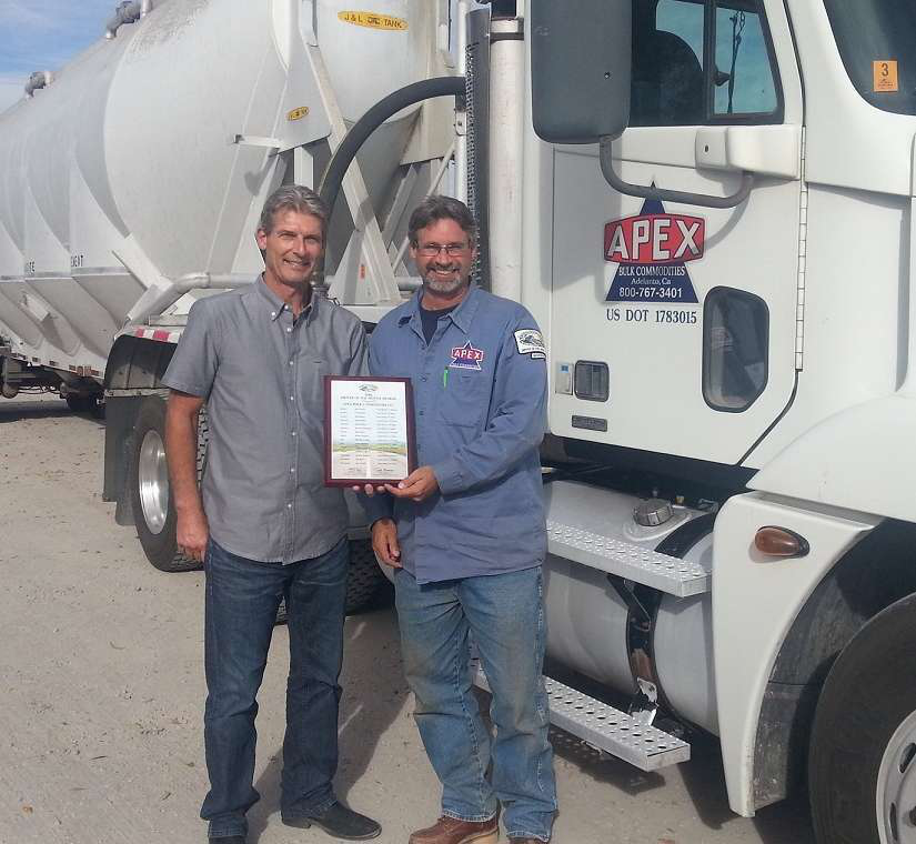 A performance review process for drivers in the fleet includes added incentives for both company drivers and leased owner-operator drivers. Of last year’s 2,000-plus reviews, 99.6 percent were positive, the company says. Apex also prides itself on getting feedback from drivers on other personnel. Pictured here with company president Steve Gale (left) is Glenn Michael, one of several California Trucking Association Drivers of the Month for 2014.