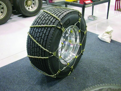 Use only good quality tire chains that fit properly. Put the chains on the tire, drive for about a mile, then check and retighten the chains to ensure a good fit.