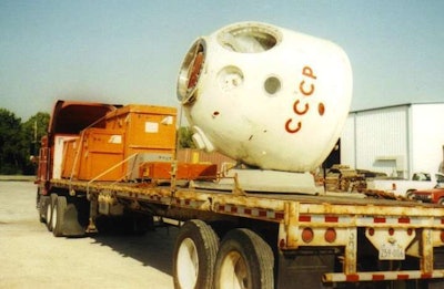 James Karalis (aka Jimmy the Greek) sent in these shots of a haul to Houston of a Russian space capsule and assorted crates of associated equipment. The capsule was “welded to a skid for the shipment” says Karalis. “I hauled it the day after 9/11 — you should have seen the looks I got. And the trouble getting into the space center that day.” The capsule was set to be put on display there at the time.