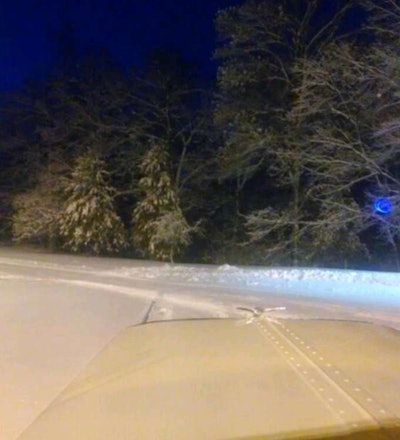 This last of the three preceding shots, which all came from the phone camera of driver Jeff Sirvas, was taken as the driver finally reached a rest area on an interstate near Effingham, Ill., as the road was closed.