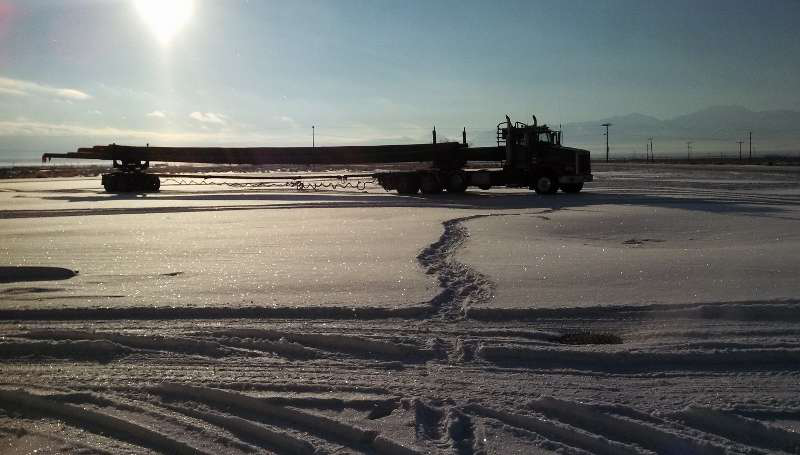 A beatiful landscape here from David Forfar, this 2005 Peterbilt &ldquo;hauling a load of 120-foot utility poles from Oregon to Arizona.&rdquo; The shot was taken in December of 2013 along the way in Nevada