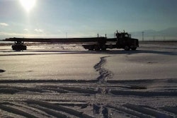 A beatiful landscape here from David Forfar, this 2005 Peterbilt “hauling a load of 120-foot utility poles from Oregon to Arizona.” The shot was taken in December of 2013 along the way in Nevada