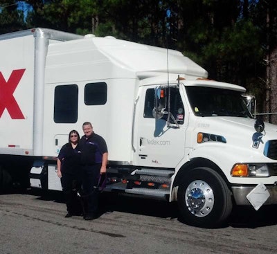 Andy and Myrian Johnson and FedEx Custom Critical truck