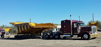 Chris Thompson sent in this shot of a buddy of his’ truck pulling the monster Cat bed between Laredo and Houston.