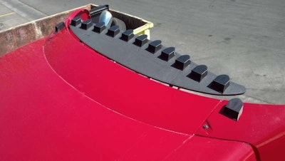 VorBlade’s small vortex generator blades are wishbone-shaped airfoils that smooth airflow over a truck’s trailing edges like the back of a cab or trailer.