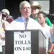Then Pennsylvania Congresman John Peterson, flanked by owner-operators and others, in a rally against I-80 toll plans in Pennsylvania several years back. Find coverage of the issue here.