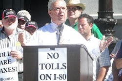 Then Pennsylvania Congresman John Peterson, flanked by owner-operators and others, in a rally against I-80 toll plans in Pennsylvania several years back. Find past coverage of the issue on Channel 19 here.
