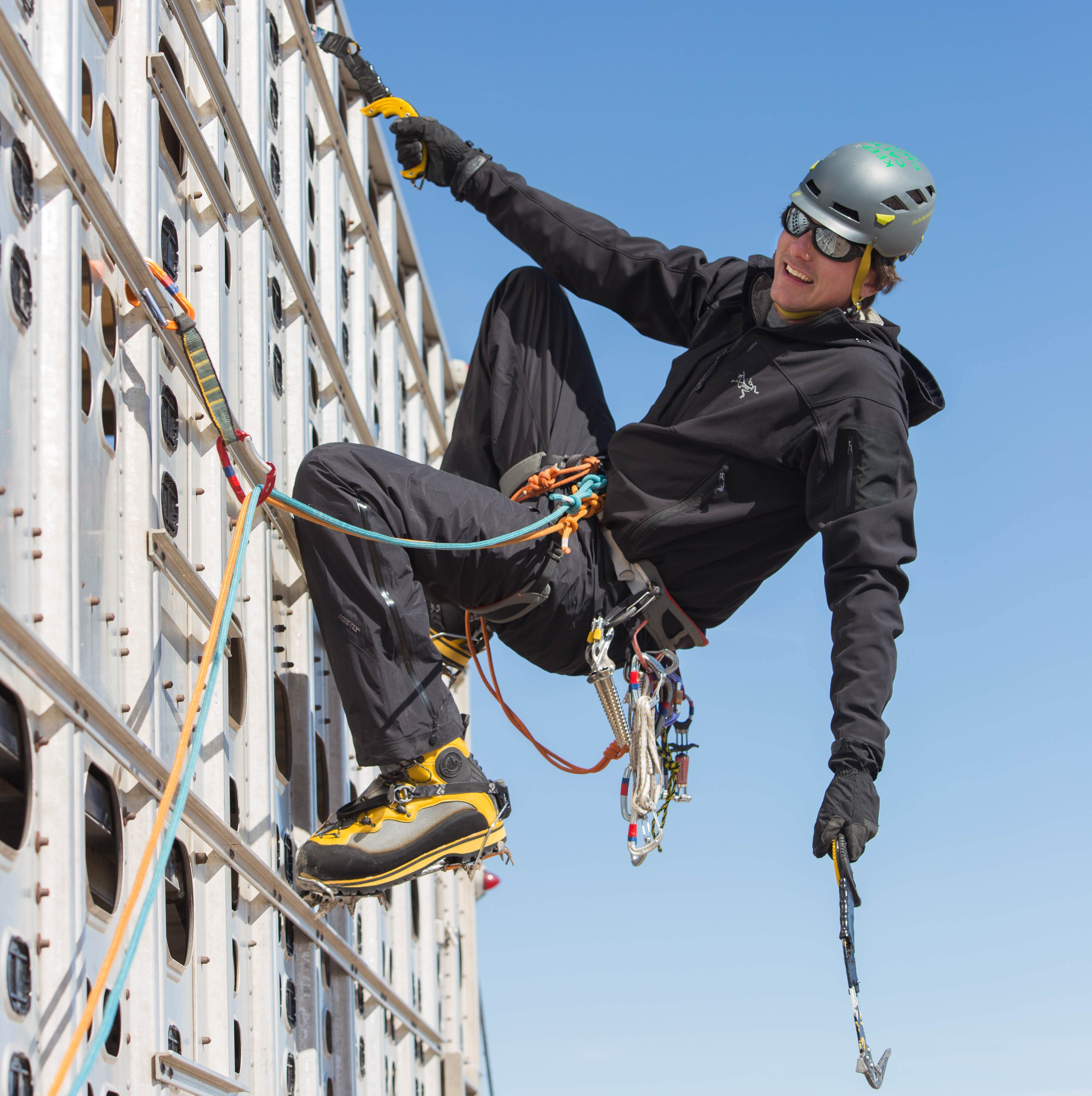 Matt Hopkins climbing his trailer