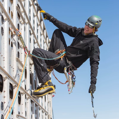 Matt Hopkins climbing his trailer