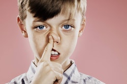 boy picking nose